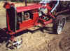 Front view of the red tractor.