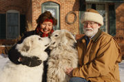 Molly Bear, Sarah, Asher and Bob in front of the house.