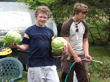Josh and JD clean the cabbages.