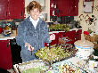 Sarah prepares a fresh salad from veggies grown in the basement.