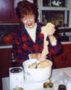 Sarah pulls the bread dough from the Bosch after it has been kneaded.