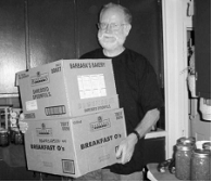 Bob brings in two boxes of Barbara's organic cereal.